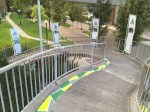Painted ground and banners on bridge